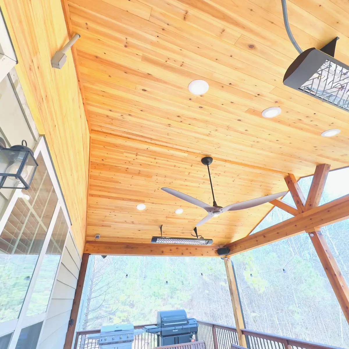 Covered deck with cedar ceiling, heaters and gable trusses