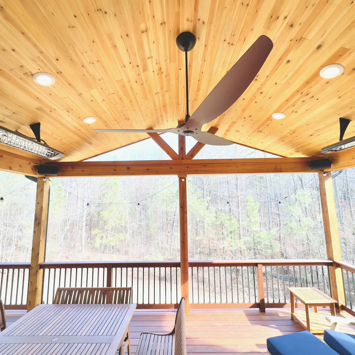 Cedar gable ceiling with ceiling fan on a covered deck