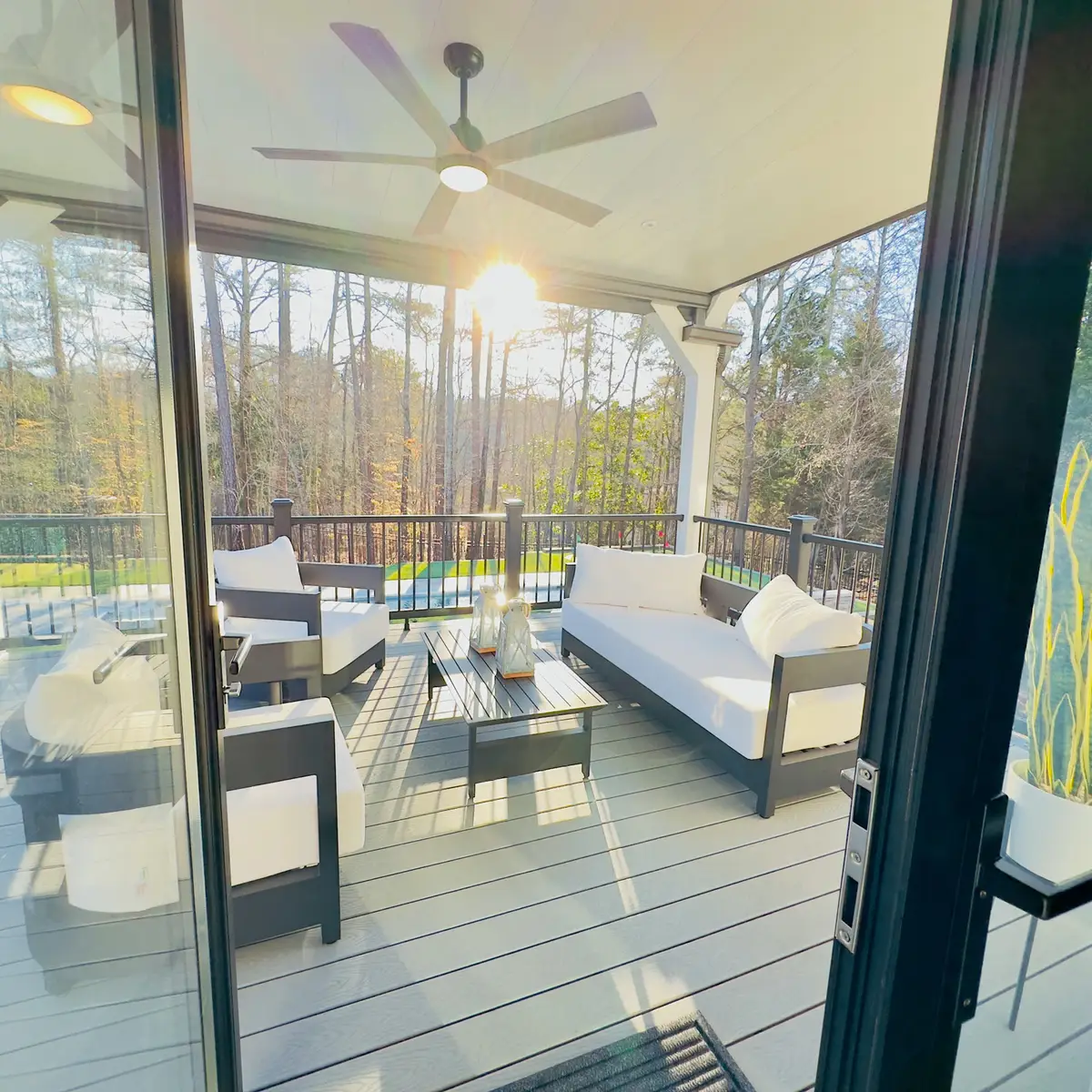Covered composite deck lounge with ceiling fan